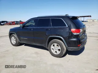 2014 Jeep Grand Cherokee Laredo with VIN 1C4RJEAGXEC217249, listed as a Copart auction lot 48585195 with 131,635 mi miles and Salvage Title. Bid and sale history available at DreamBid. Image 2.