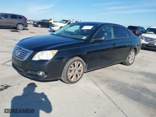 2009 Toyota Avalon XL with VIN 4T1BK36B89U335604, listed as a IAAI auction lot 41328877 with 166,396 mi miles. Bid and sale history available at carsss.com. Image 17.