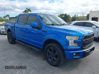 2015 Ford F-150 XL with VIN 1FTEW1CG2FKE28717, listed as a IAAI auction lot 41433414 with 104,752 mi miles. Bid and sale history available at carsss.com. Image 1.