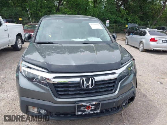 2018 Honda Ridgeline RTL-T with VIN 5FPYK3F61JB013733, listed as a IAAI auction lot 42548122 with 92,407 mi miles and . Bid and sale history available at DreamBid. Image 12.