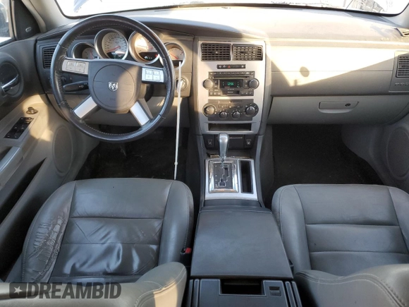 2006 Dodge Magnum R/T z VIN 2D4GV57256H187683, wystawiony jako Copart lot #87879585 z przebiegiem 260 895 mil mil oraz Szkody całkowita. Historia ofert i sprzedaży dostępna na DreamBid. Obrazek 8.