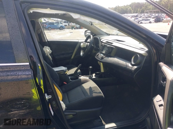 2016 Toyota RAV4 XLE with VIN 2T3RFREV9GW458057, listed as a IAAI auction lot 42651373 with 119,750 mi miles and . Bid and sale history available at DreamBid. Image 5.
