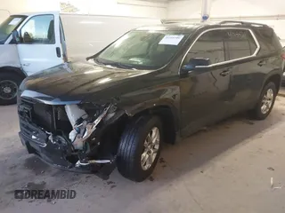 2021 Chevrolet Traverse LT Cloth with VIN 1GNEVGKW4MJ175358, listed as a IAAI auction lot 41355709 with 148,257 mi miles. Bid and sale history available at carsss.com. Image 2.