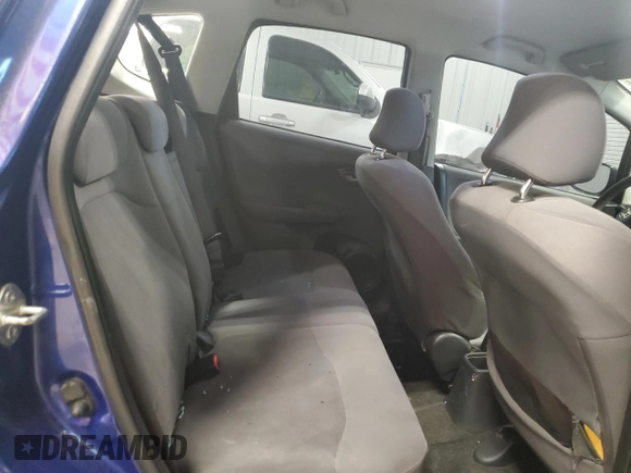 2009 Honda Fit with VIN JHMGE88229S044859, listed as a Copart auction lot 52742495 with 398,726 mi miles and Salvage Title. Bid and sale history available at carsss.com. Image 10.