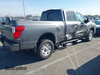 2021 Nissan Titan SV with VIN 1N6AA1FA6MN529806, listed as a IAAI auction lot 41859992 with 50,729 mi miles and . Bid and sale history available at DreamBid. Image 4.