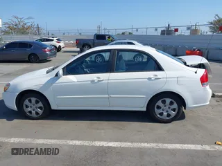 2009 Kia Spectra LX z VIN KNAFE222995623894, wystawiony jako IAAI lot #42385181 z przebiegiem 119 030 mil mil oraz . Historia ofert i sprzedaży dostępna na DreamBid. Obrazek 14.