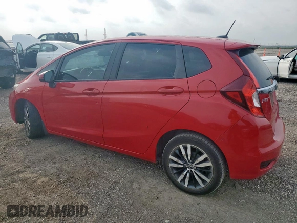 2018 Honda Fit EX-L with VIN 3HGGK5H97JM706911, listed as a Copart auction lot 57121595 with 117,375 mi miles and Salvage title. Bid and sale history available at DreamBid. Image 2.