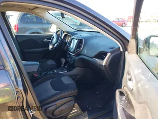 2014 Jeep Cherokee Latitude with VIN 1C4PJMCB5EW294631, listed as a IAAI auction lot 41453628 with 127,847 mi miles and . Bid and sale history available at DreamBid. Image 5.