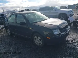 1999 Volkswagen Jetta GLS z VIN 3VWSA29M0XM084459, wystawiony jako IAAI lot #41170665 z przebiegiem 76 790 mil mil oraz . Historia ofert i sprzedaży dostępna na DreamBid. Obrazek 1.
