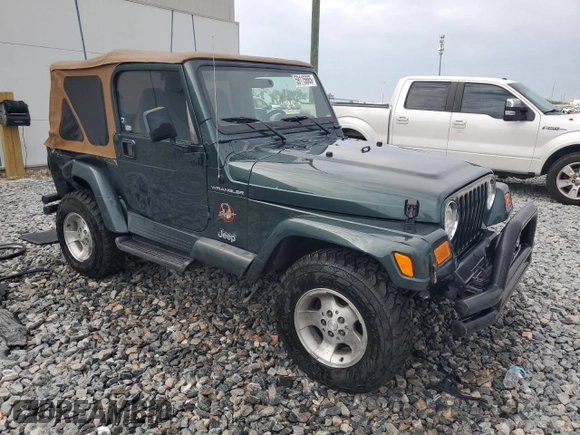2002 Jeep Wrangler Sahara with VIN 1J4FA59S52P763290, listed as a Copart auction lot 59115665 with 129,479 mi miles and Non repairable. Bid and sale history available at DreamBid. Image 4.