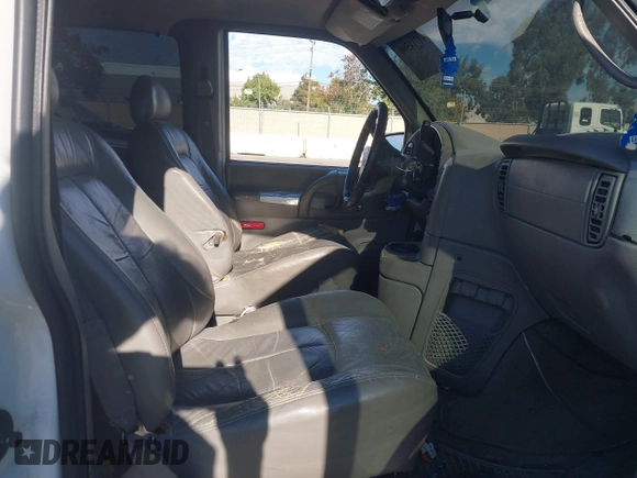 2002 Chevrolet Astro with VIN 1GNDM19X72B125295, listed as a IAAI auction lot 40714590 with 190,607 mi miles. Bid and sale history available at carsss.com. Image 5.