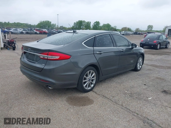 2017 Ford Fusion Energi SE with VIN 3FA6P0PU9HR227932, listed as a IAAI auction lot 42177500 with 106,938 mi miles. Bid and sale history available at carsss.com. Image 4.