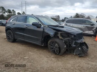 2023 Cadillac XT4 FWD Luxury with VIN 1GYAZAR45PF218684, listed as a Copart auction lot 46483515 with 74,920 mi miles and Salvage title. Bid and sale history available at DreamBid. Image 4.