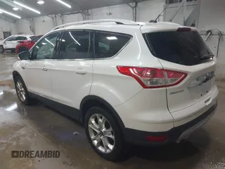 2014 Ford Escape Titanium with VIN 1FMCU9J90EUD21552, listed as a IAAI auction lot 42102148 with 183,539 mi miles. Bid and sale history available at carsss.com. Image 3.