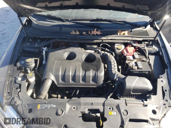 2015 Ford Taurus SEL with VIN 1FAHP2E90FG148821, listed as a Copart auction lot 77557384 with 141,514 mi miles and Salvage Title. Bid and sale history available at DreamBid. Image 11.