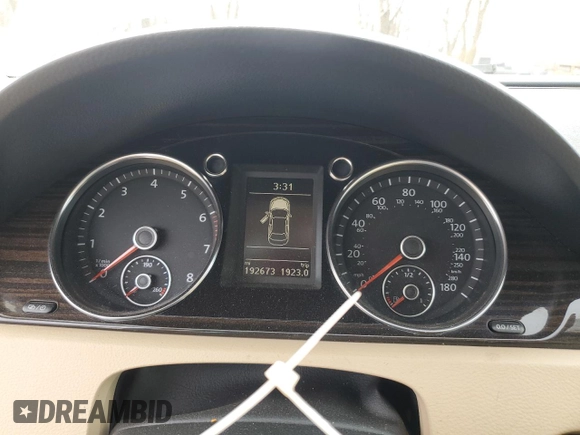 2014 Volkswagen CC Executive z VIN WVWRP7AN8EE525596, wystawiony jako Copart lot #51208465 z przebiegiem 192 673 mil mil oraz Szkoda całkowita • Salvage title. Historia ofert i sprzedaży dostępna na DreamBid. Obrazek 9.
