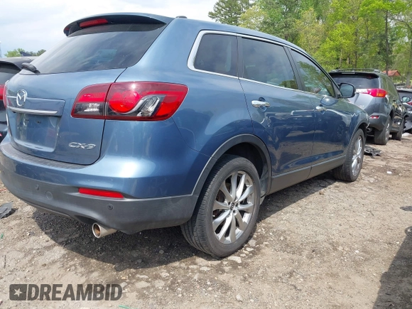 2014 Mazda CX-9 Grand Touring with VIN JM3TB2DA7E0427423, listed as a IAAI auction lot 42006817 with 95,248 mi miles and . Bid and sale history available at DreamBid. Image 4.