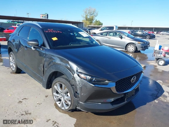 2022 Mazda CX-30 2.5 S Premium Package with VIN 3MVDMBDL9NM447077, listed as a IAAI auction lot 41199286 with NaN miles. Bid and sale history available at carsss.com. Image 1.
