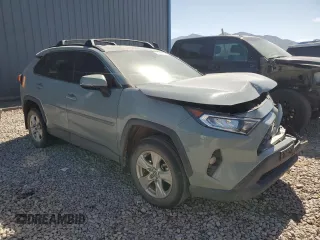 2021 Toyota RAV4 XLE with VIN 2T3W1RFV4MW134798, listed as a Copart auction lot 58802435 with 74,495 mi miles and Salvage title. Bid and sale history available at DreamBid. Image 4.