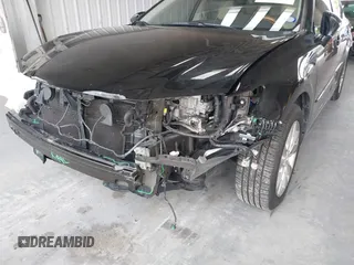 2014 Lexus ES 300h with VIN JTHBW1GG9E2043696, listed as a IAAI auction lot 42392424 with 74,370 mi miles and . Bid and sale history available at DreamBid. Image 6.