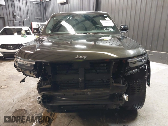 2023 Jeep Grand Cherokee Overland with VIN 1C4RJHDG0P8701157, listed as a IAAI auction lot 42080201 with 24,709 mi miles and . Bid and sale history available at DreamBid. Image 13.