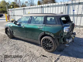 2019 MINI Clubman Cooper with VIN WMWLU1C59K2F29677, listed as a Copart auction lot 77201334 with 57,012 mi miles and Salvage Title. Bid and sale history available at carsss.com. Image 2.