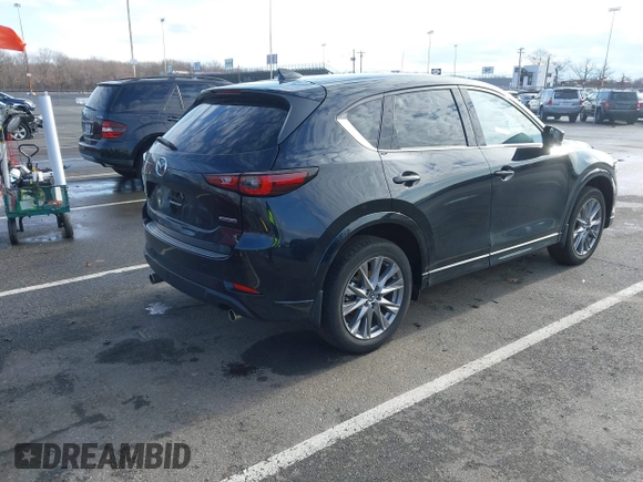 2024 Mazda CX-5 2.5 S Premium Package with VIN JM3KFBDM3R0400333, listed as a IAAI auction lot 41741454 with 14,116 mi miles. Bid and sale history available at carsss.com. Image 4.