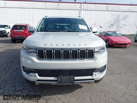 2022 Jeep Wagoneer Series III with VIN 1C4SJVDT7NS137133, listed as a IAAI auction lot 42024318 with 53,511 mi miles and . Bid and sale history available at DreamBid. Image 12.