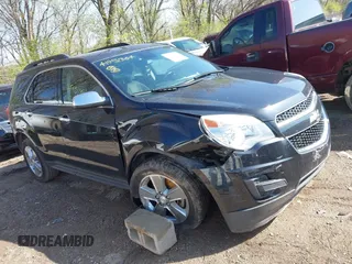 2015 Chevrolet Equinox LT z VIN 2GNALBEK6F6134326, wystawiony jako IAAI lot #41951304 z przebiegiem 123 055 mil mil oraz . Historia ofert i sprzedaży dostępna na DreamBid. Obrazek 1.