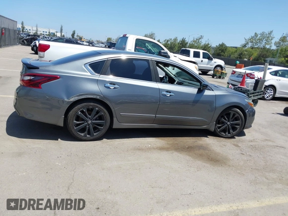 2017 Nissan Altima S z VIN 1N4AL3AP9HC236901, wystawiony jako IAAI lot #42275150 z przebiegiem 136 230 mil mil oraz . Historia ofert i sprzedaży dostępna na DreamBid. Obrazek 13.