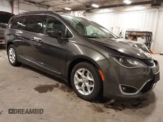 2017 Chrysler Pacifica Touring L with VIN 2C4RC1BG5HR803306, listed as a IAAI auction lot 41968455 with 84,714 mi miles and . Bid and sale history available at DreamBid. Image 1.
