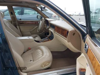 1996 Jaguar XJ with VIN SAJHX1743TC759842, listed as a IAAI auction lot 41778155 with 189,315 mi miles and . Bid and sale history available at DreamBid. Image 5.