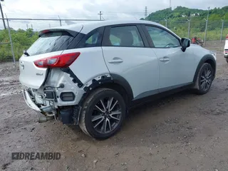 2017 Mazda CX-3 Touring z VIN JM1DKFC7XH0141919, wystawiony jako IAAI lot #42333679 z przebiegiem 93 234 mil mil oraz . Historia ofert i sprzedaży dostępna na DreamBid. Obrazek 4.