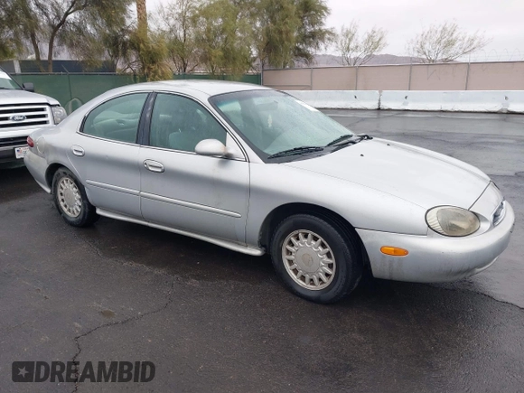 1997 Mercury Sable GS z VIN 1MELM50U8VG603194, wystawiony jako IAAI lot #41558010 z przebiegiem 265 169 mil mil oraz . Historia ofert i sprzedaży dostępna na DreamBid. Obrazek 1.