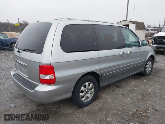 2004 Kia Sedona LX with VIN KNDUP131546535352, listed as a IAAI auction lot 41856784 with 128,943 mi miles. Bid and sale history available at carsss.com. Image 4.