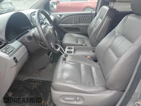 2008 Honda Odyssey EX-L с VIN 5FNRL38728B026100, выставлен на аукционе Copart как лот 61430225 с пробегом 168 037 миль миль и Чистый • Clean title. История ставок и продаж доступна на DreamBid. Изображение 7.