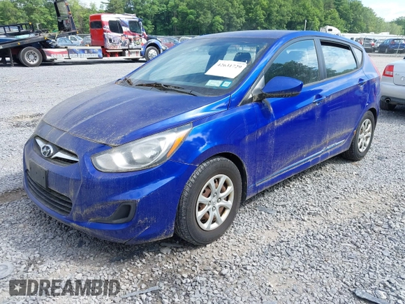 2012 Hyundai Accent GS with VIN KMHCT5AE0CU010189, listed as a IAAI auction lot 42631729 with 169,780 mi miles and . Bid and sale history available at DreamBid. Image 2.