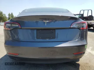 2023 Tesla Model 3 with VIN 5YJ3E1EA4PF615975, listed as a Copart auction lot 58845405 with 38,927 mi miles and Salvage title. Bid and sale history available at DreamBid. Image 6.