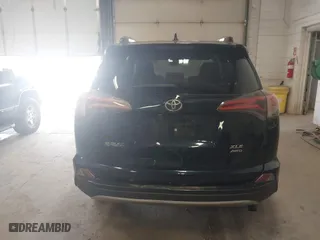 2017 Toyota RAV4 XLE with VIN JTMRFREV6HD208421, listed as a IAAI auction lot 42078130 with 228,365 mi miles. Bid and sale history available at carsss.com. Image 16.