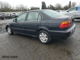 1999 Honda Civic EX with VIN 2HGEJ8644XH541829, listed as a Copart auction lot 45734025 with 129,960 mi miles and Salvage Title. Bid and sale history available at carsss.com. Image 2.