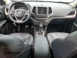 2014 Jeep Cherokee Limited with VIN 1C4PJLDB8EW256206, listed as a Copart auction lot 61712925 with 75,666 mi miles and Salvage title. Bid and sale history available at DreamBid. Image 8.