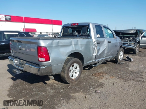 2021 Ram 1500 Tradesman with VIN 1C6RR6FG6MS550891, listed as a IAAI auction lot 42013131 with 100,229 mi miles and . Bid and sale history available at DreamBid. Image 4.