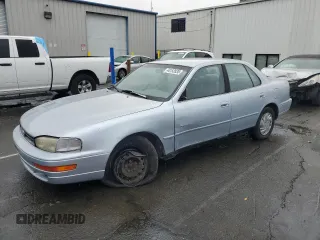 1994 Toyota Camry LE with VIN 4T1SK12E8RU411682, listed as a Copart auction lot 44153535 with 214,022 mi miles and Salvage Title. Bid and sale history available at carsss.com. Image 1.