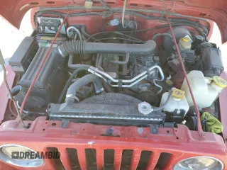 2000 Jeep Wrangler Sport with VIN 1J4FA49S1YP703560, listed as a Copart auction lot 73647844 with 117,300 mi miles and Salvage Title. Bid and sale history available at carsss.com. Image 11.