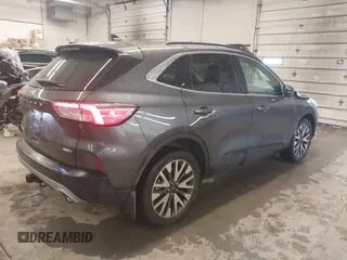 2020 Ford Escape Titanium with VIN 1FMCU9J95LUA39338, listed as a IAAI auction lot 42319122 with 34,631 mi miles and . Bid and sale history available at DreamBid. Image 4.