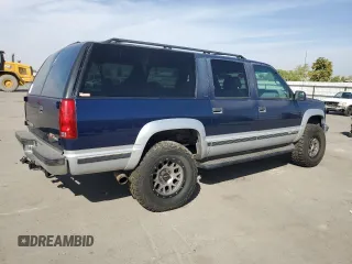 1997 GMC Suburban z VIN 1GKFK16R6VJ758513, wystawiony jako Copart lot #75034574 z przebiegiem 181 873 mil mil oraz Szkody całkowita. Historia ofert i sprzedaży dostępna na DreamBid. Obrazek 3.