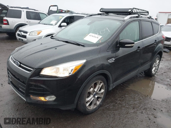 2015 Ford Escape Titanium with VIN 1FMCU0J97FUB45709, listed as a IAAI auction lot 41561636 with 88,296 mi miles. Bid and sale history available at carsss.com. Image 17.