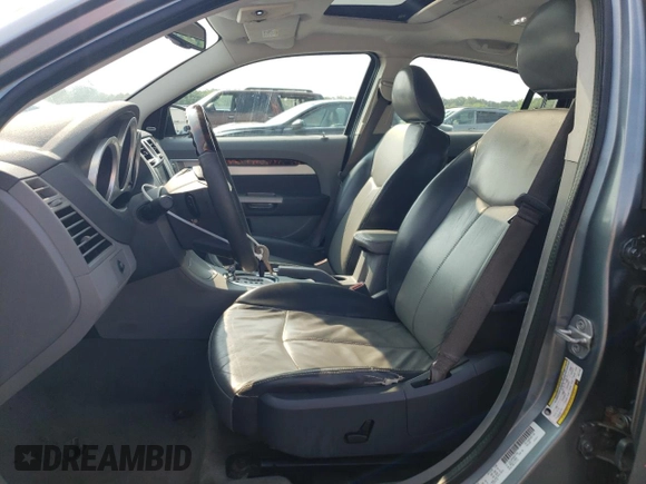 2008 Chrysler Sebring Limited with VIN 1C3LC66M08N277459, listed as a Copart auction lot 60237525 with 122,590 mi miles and Salvage title. Bid and sale history available at DreamBid. Image 7.