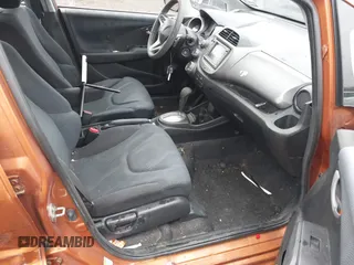 2010 Honda Fit Sport with VIN JHMGE8H63AS024532, listed as a IAAI auction lot 41469799 with 167,750 mi miles and . Bid and sale history available at DreamBid. Image 5.