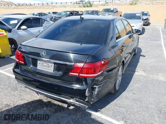 2014 Mercedes-Benz E 350 Sport with VIN WDDHF5KBXEA889555, listed as a IAAI auction lot 41589052 with 148,422 mi miles and . Bid and sale history available at DreamBid. Image 4.